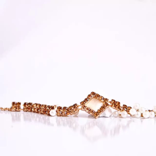 Gold and White Pearls Braclet